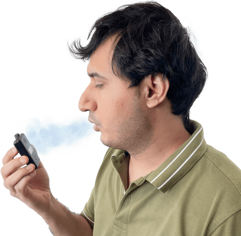 a man using prana air breathalyzer