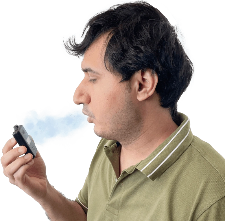 a man using prana air breathalyzer